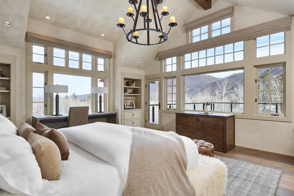 Primary bedroom at Aspen Renovation, Aspen, Colorado, interior design by Paul Lauren Designs