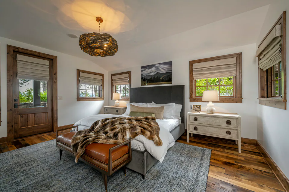 Primary bedroom at Cabin on the Lake, Coeur d'Alene Lake, Idaho, interior design by Paul Lauren Designs
