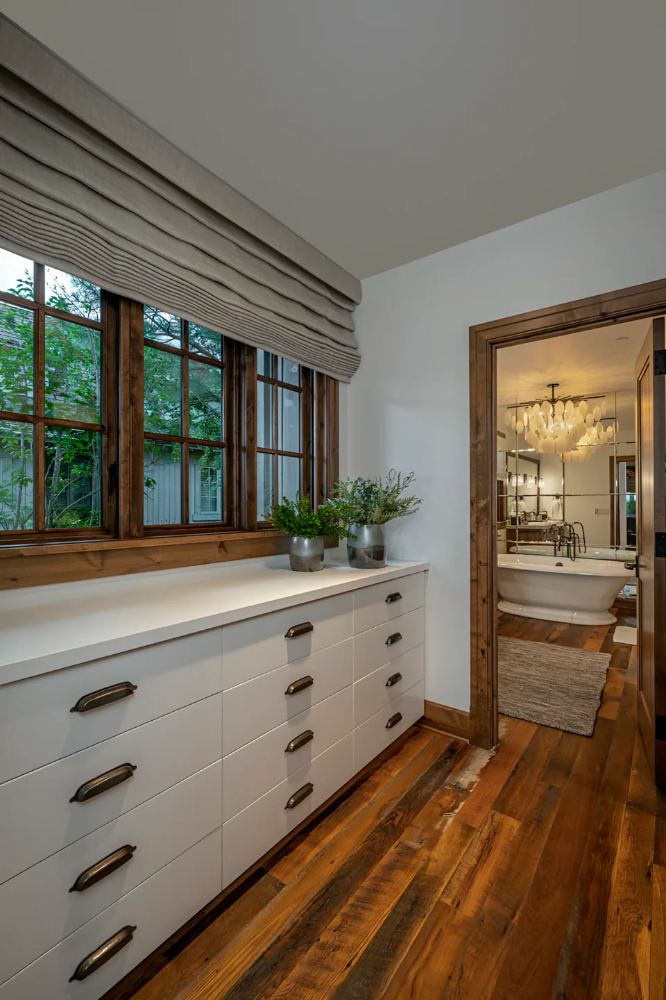Primary suite at Cabin on the Lake, Coeur d'Alene Lake, Idaho, interior design by Paul Lauren Designs