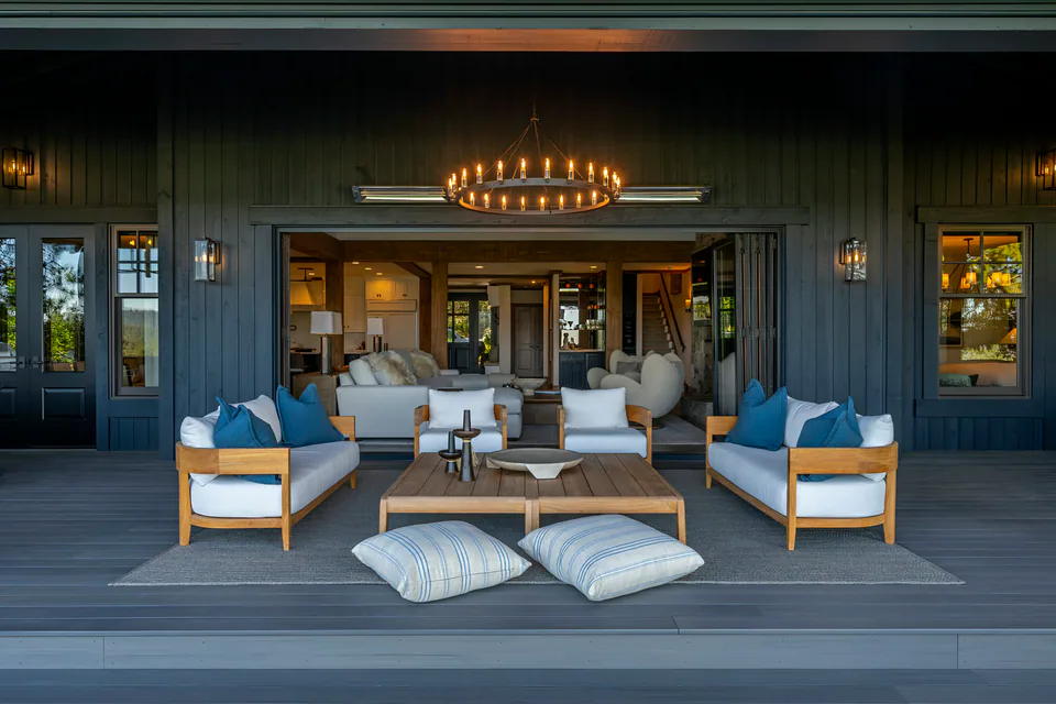 Covered porch at Cabin with a View, Coeur d'Alene Lake, Idaho, interior design by Paul Lauren Designs