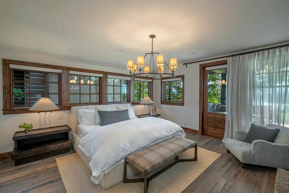 Primary bedroom at Cabin with a View, Coeur d'Alene Lake, Idaho, interior design by Paul Lauren Designs