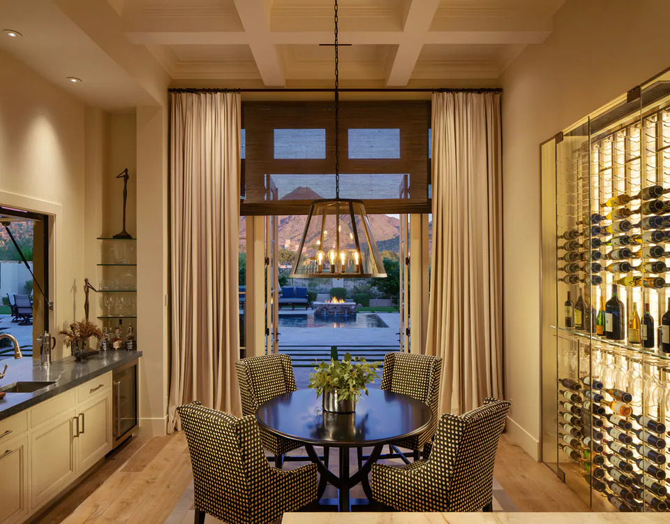 Breakfast room and wine wall at Desert Classic, Scottsdale, Arizona, interior design by Paul Lauren Designs