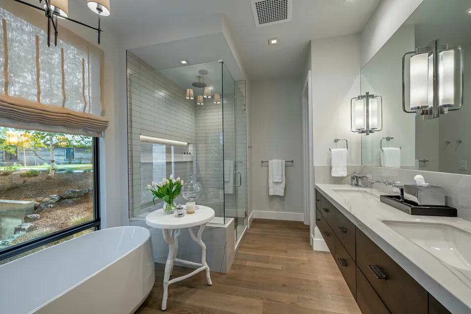 Primary bathroom at Gozzer Flats, Coeur d'Alene Lake, Idaho, interior design by Paul Lauren Designs