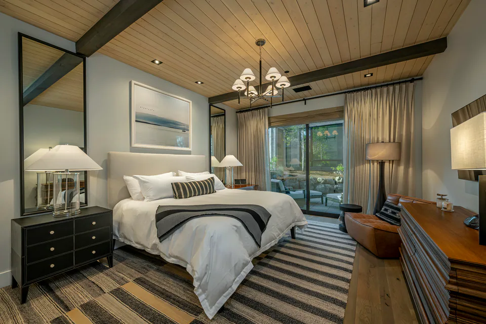 Primary bedroom at Gozzer Flats, Coeur d'Alene Lake, Idaho, interior design by Paul Lauren Designs