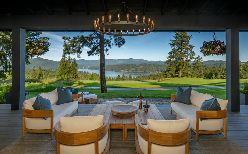 Covered porch overlooking the lake at Cabin with a View, Coeur d'Alene Lake, Idaho, by Paul Lauren Designs