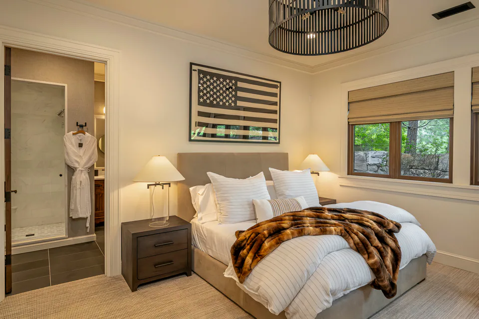 Bedroom at Lakefront Corner Condo, a private residence, interior design by Paul Lauren Designs