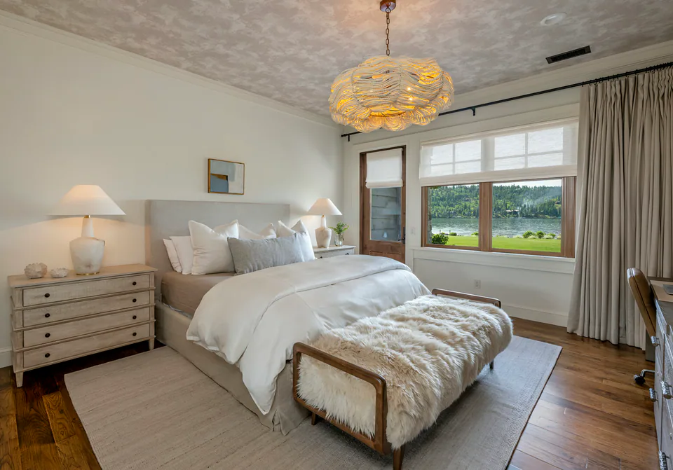 Primary bedroom at Lakefront Corner Condo, a private residence, interior design by Paul Lauren Designs