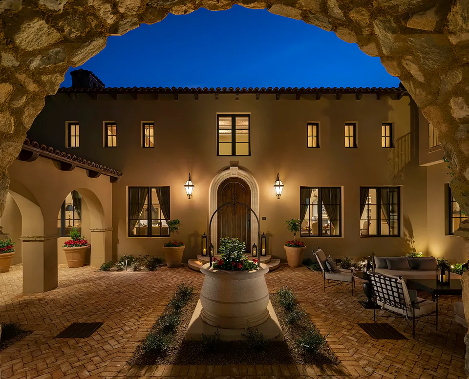 Courtyard at dusk at Silverleaf Mediterranean, North Scottsdale, Arizona, interior design by Paul Lauren Designs