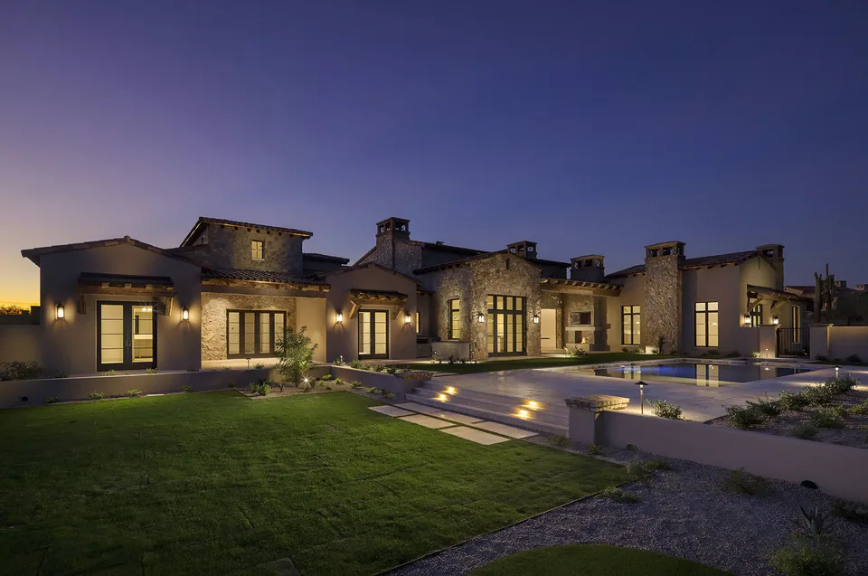 Exterior at dusk at Silverleaf Spec, North Scottsdale, Arizona, interior design by Paul Lauren Designs