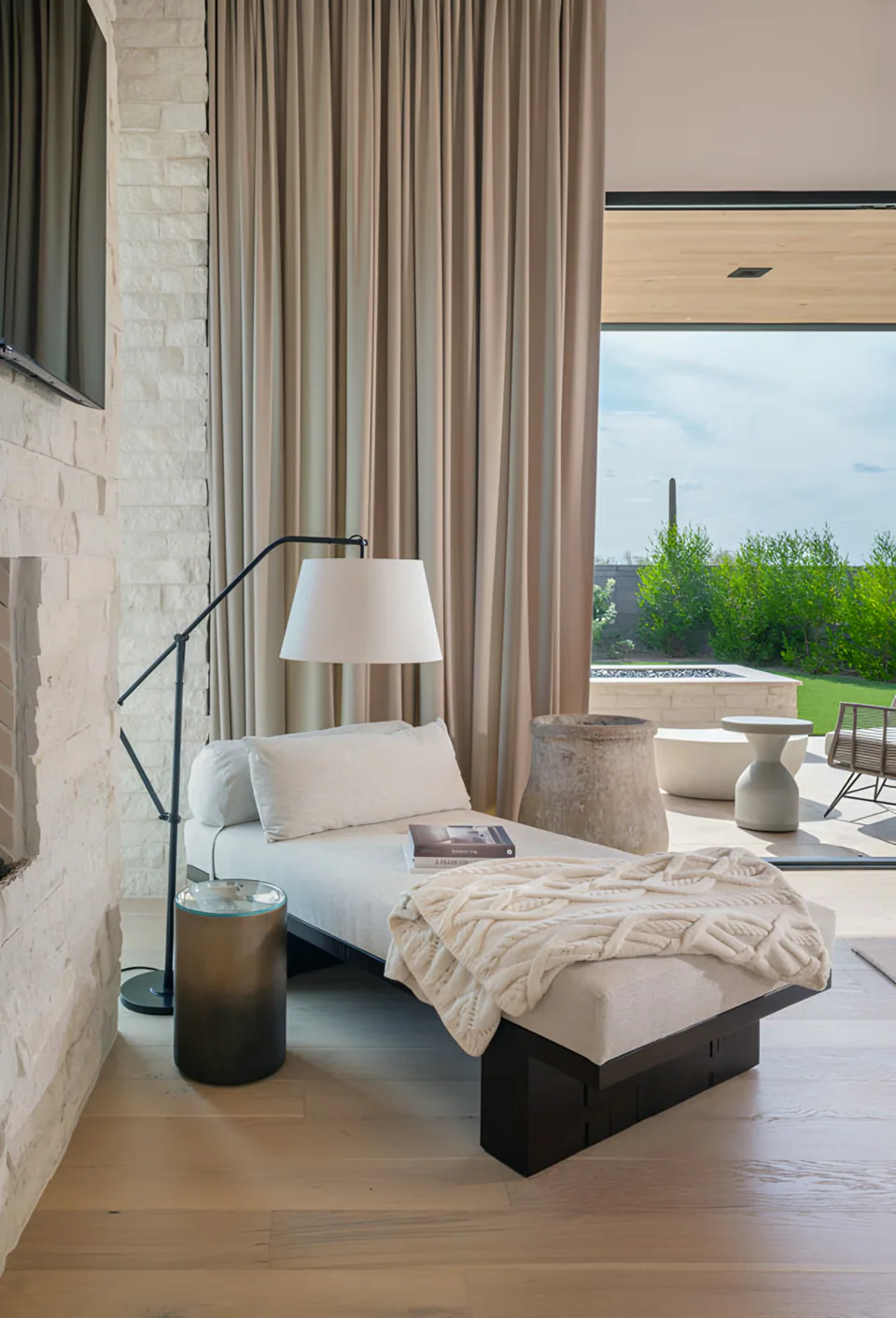 Primary suite sitting area at Solitude, a private residence, interior design by Paul Lauren Designs