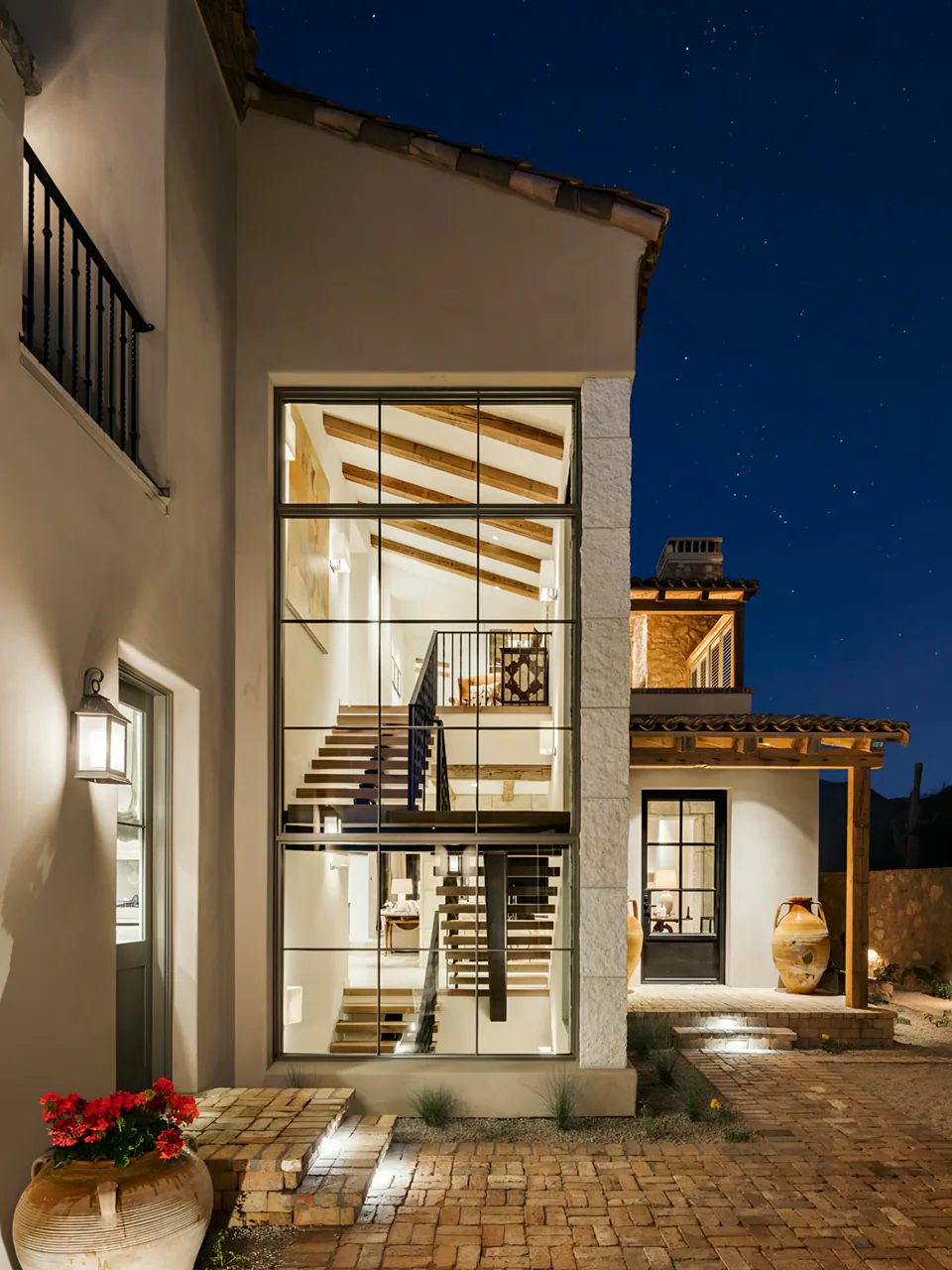 Exterior at dusk at The Village of Silverleaf, North Scottsdale, Arizona, interior design by Paul Lauren Designs